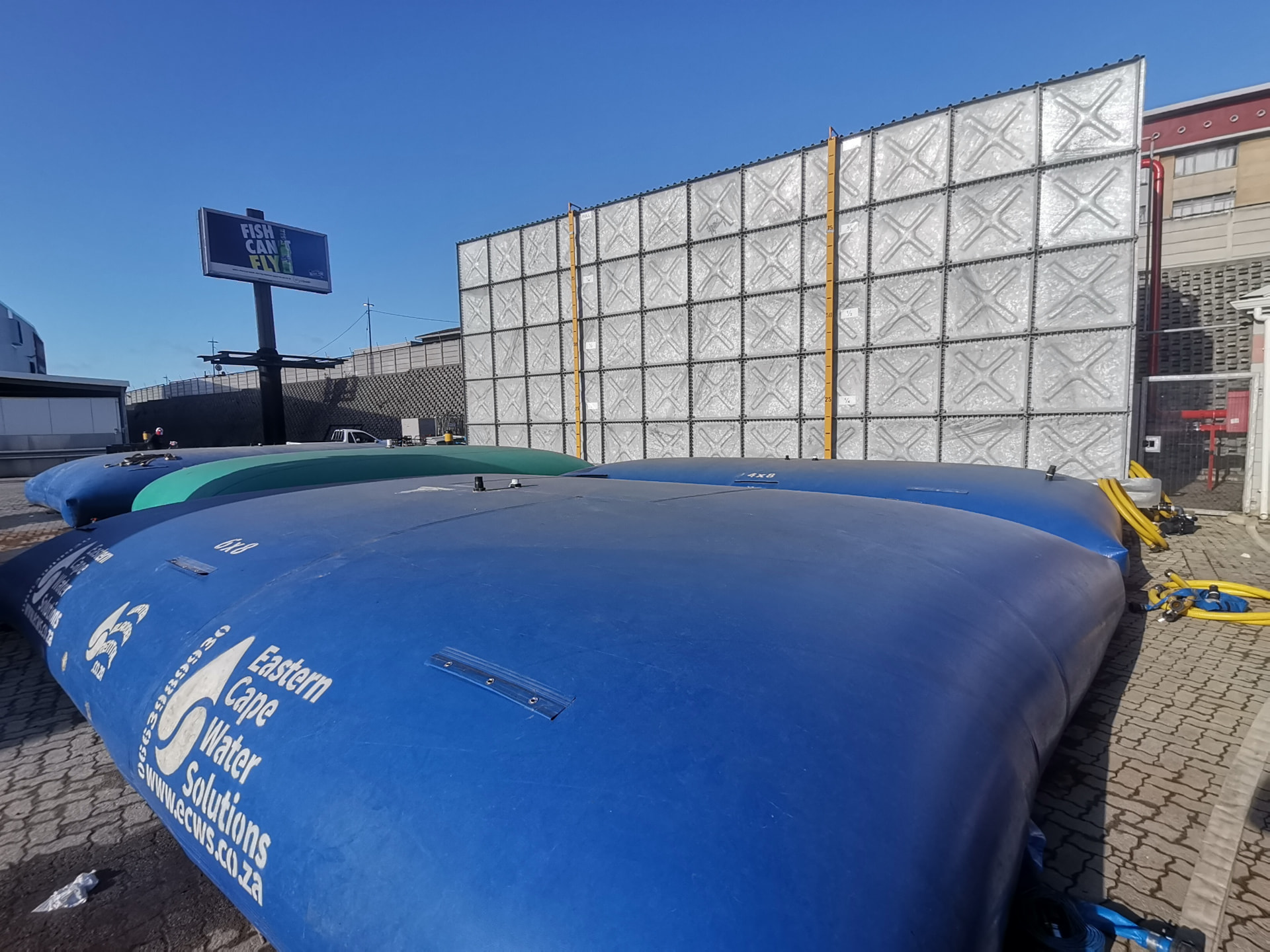 ECWS water storage bladders positioned in front of a pressed panel steel tank