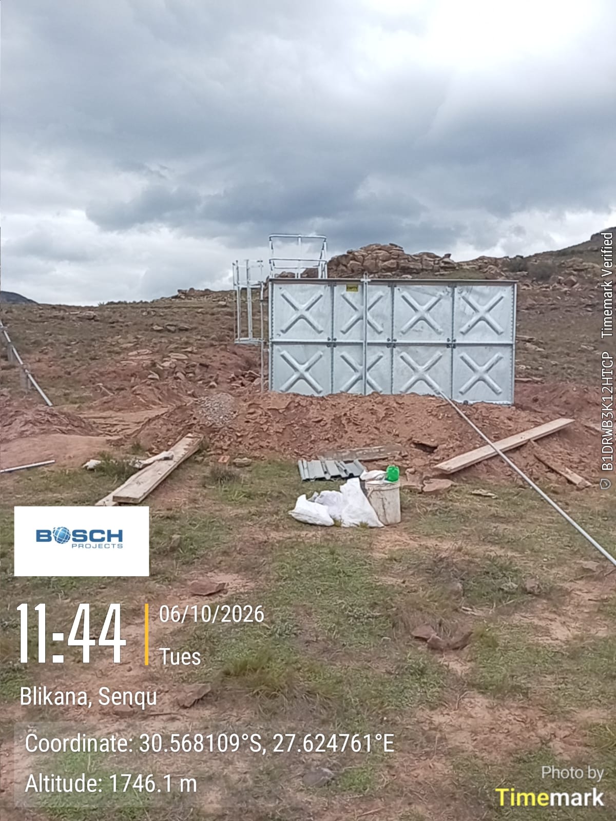 Side view of the Blikana square panel water tank with access ladder and roof guardrails