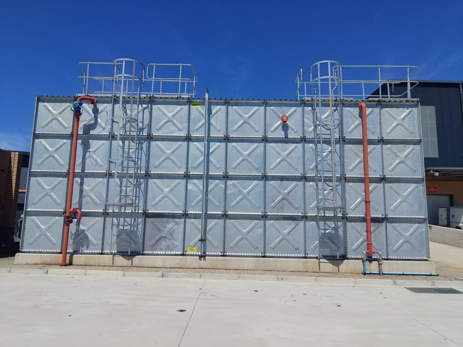 Front view of the Bidfood 1 ML square panel tank with access ladders and fire water pipework, Port Elizabeth